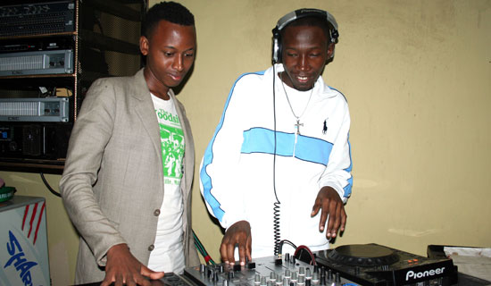 Tumwiine and Switch on the Pioneer decks. Photo By Abubaker Lubowa