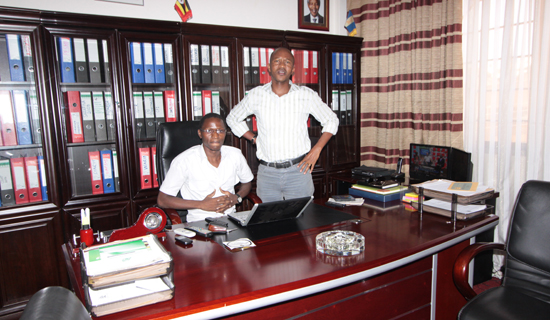Afenila (left), meets Frank Gashumba in his office.   PHOTOS BY ISMAIL KEZAALA.