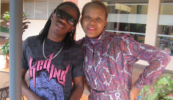 Nince Henry and his fan Diana at Silver Springs Hotel.   PHOTO BY ISAAC SSEJJOMBWE