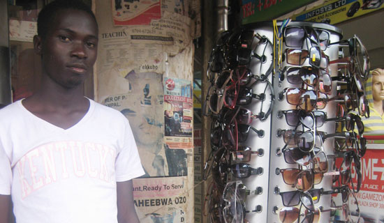 Kasozi with his merchandise PHOTO BY I. SSEJJOMBWE