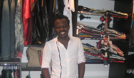 Ahumuza at his shop at Garden City. Photo by Isaac Ssejjombwe. 