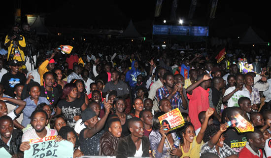 Revellers enjoying Bebe Cool’s concert. Unfortunately, not everyone who attends big shows is there to watch the artiste. Some  are there to tob showgoers valuables like mobile phones. Photo by Eddie Chicco.