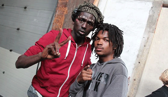 Burney MC (R) was an opening act for world renowned South Sudanese artiste Emmanuel Jal at a show in Europe. COURTESY PHOTO