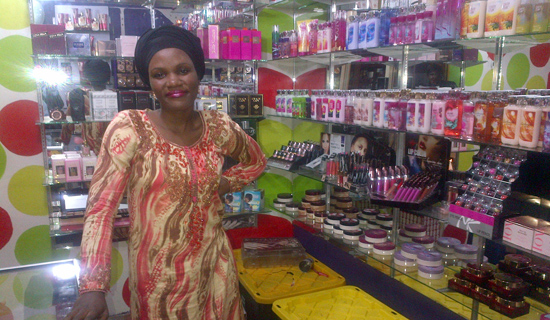 Nakkazi in her cosmetics shop. PHOTO BY ISAAC SSEJJOMBWE 