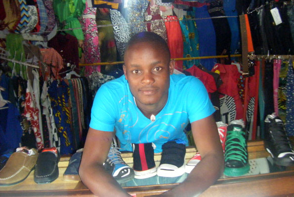Mutaawe at his boutique in Masaka. He sells both men and women’s wear. The 25-year-old says his dream is to own a wholesale store in one of the Kampala arcades. PHOTO by Shamim J. Nakawooya