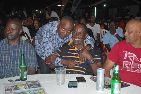 Min.-Ronald-Kibuule-having-a-light-moment-with-Capt.-Mike-Mukula