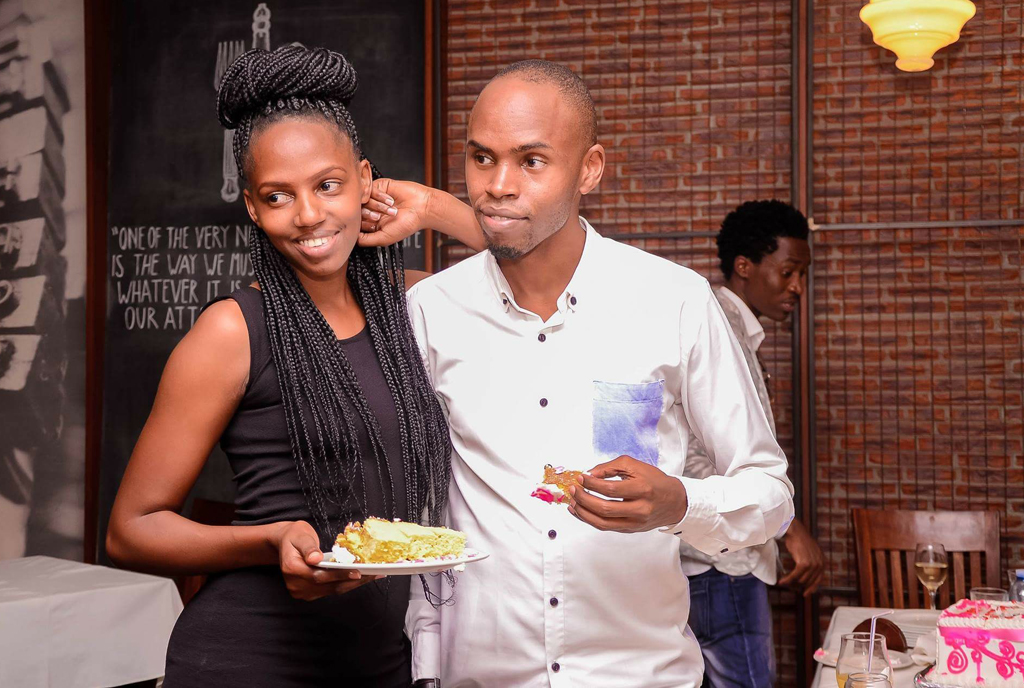 Muhangi and Asiimwe during a social function.  PHOTO by Isaac Ssejjombwe 