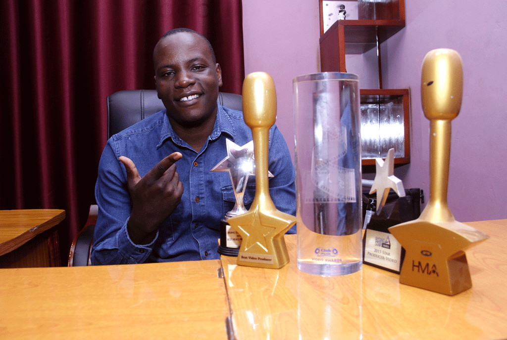 Jahlive shows of some of the awards he has won. The video director says the biggest challenge in the industry is artistes who do not keep time for shoots. PHOTO by Abubaker Lubowa