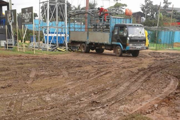 Messy field of play. Skid marks on the cricket oval outfield of Lugogo caused by trucks organising Zoe Fellowship