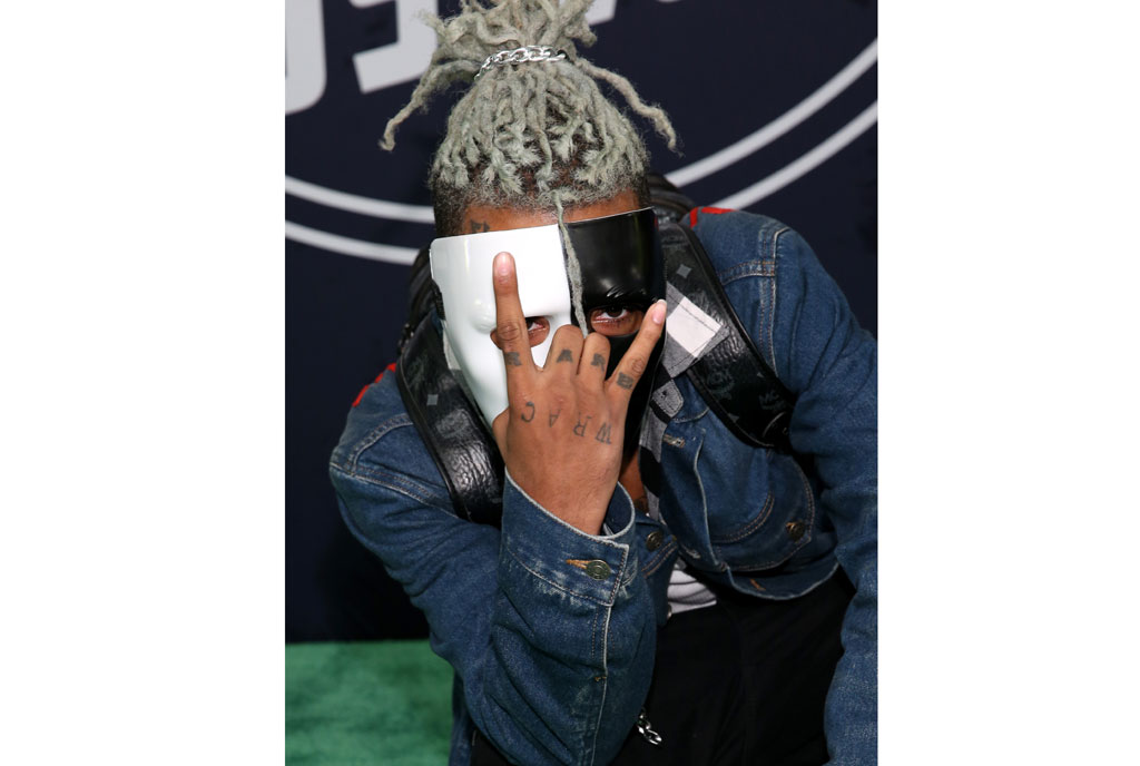 In this file photo taken on October 05, 2017 showing rapper XXXTentacion attending the BET Hip Hop Awards 2017 at The Fillmore Miami Beach at the Jackie Gleason Theater in Miami Beach, Florida