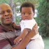 Kabaka Mutebi and baby son, Richard Ssemakookiro.
