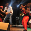 Goodlyf and P square during a stage performance