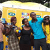 MTN’s Susan Kayemba (C), musician Rabadaba (R) and winners of phones