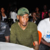 Young tycoon Bryan White (C) and his personal security at the Radio & Weazal 10 years anniversary concert