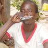 A man drinks alcohol in a sachet in Lira. FILE PHOTO