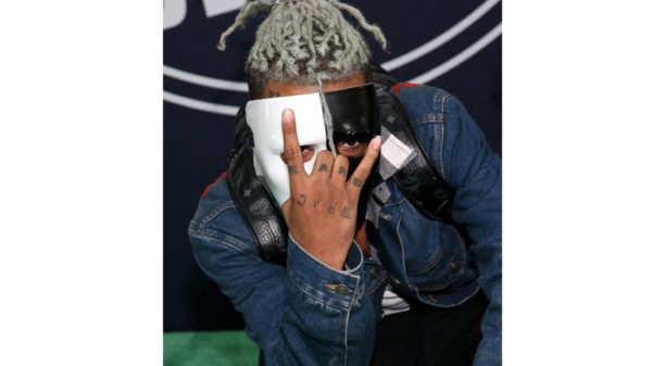 In this file photo taken on October 05, 2017 showing rapper XXXTentacion attending the BET Hip Hop Awards 2017 at The Fillmore Miami Beach at the Jackie Gleason Theater in Miami Beach, Florida
