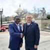 Men of importantance . Mr Pemba (L)shakes hands with Peter Anderson, an American politician from Texas who served in the US House of Representatives for 11 terms,soon after the important meeting at Washington DC senate