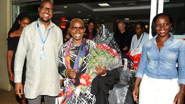Saxophonist Isaiah Katumwa (L) and UBL's Luxury Portfolio Manager Annette Nakiyaga (R) welcome Grammy Award winner Angelique Kidjo (M) at Entebbe Airprort on Sunday night. Angelique is set to perform at the Kampala Serena Hotel on Tuesday April 30 in a show to commemorate World Jazz Day. She will share the stage with Darren Rahn and Katumwa in the show powered by Johnnie Walker.